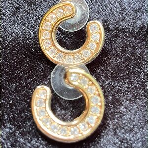 Vintage Swarovski swan signed crystal partial hoop
Pierced earrings